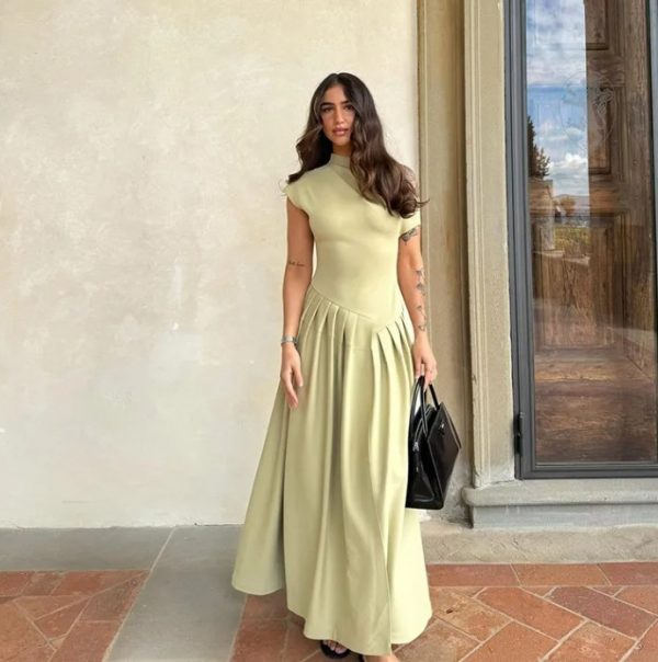 Hot selling round neck slanted shoulder short sleeved dress with a large swing