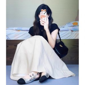 Two-Piece Skirt Set - Unique Black Top with Text and Trendy Half Skirt, Age-Reducing Fashionable Summer New Arrival